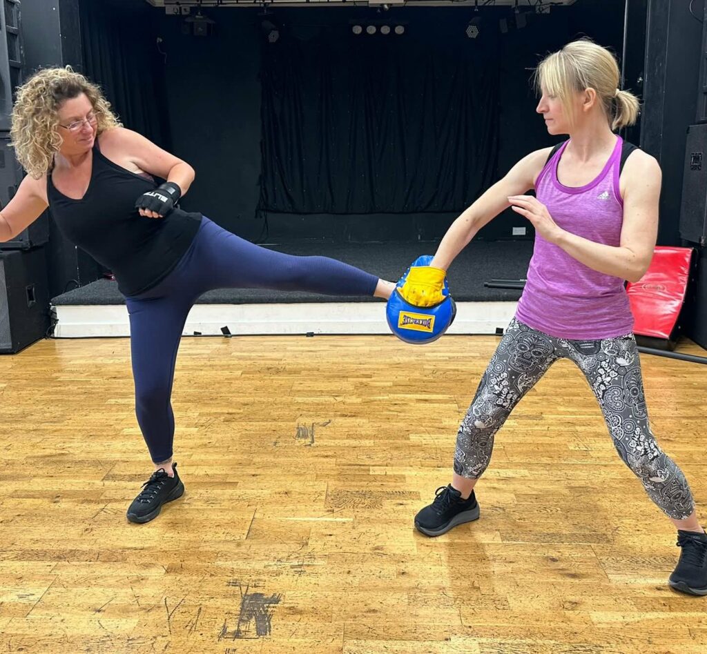 two women kickboxing